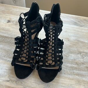 Black bootie heels size 7.5